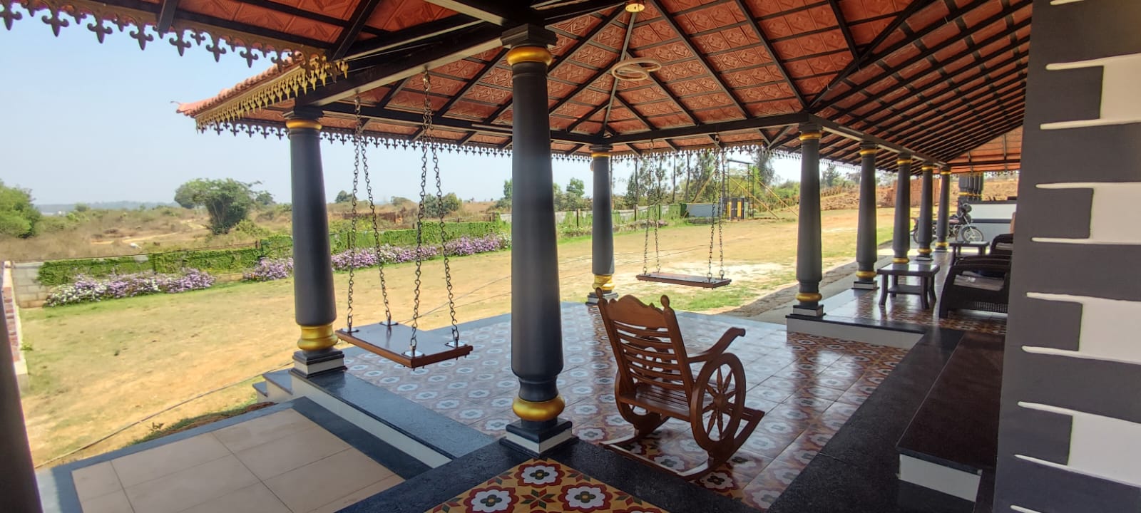 Wooden porch with garden view at Aqua Terra Villas - Belur, Sakleshpur
